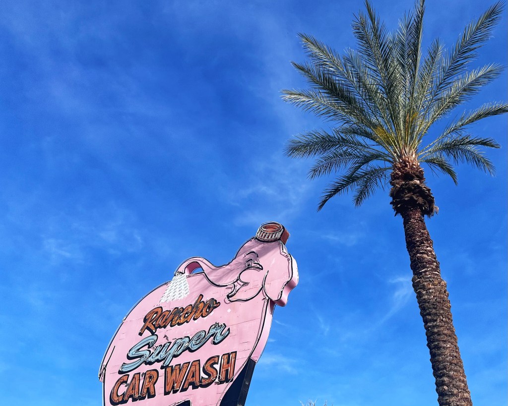 The Instagrammable pink elephant carwash sign in Palm Springs.