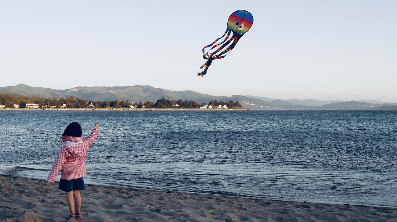 Flying a kite in Newport, Oregon